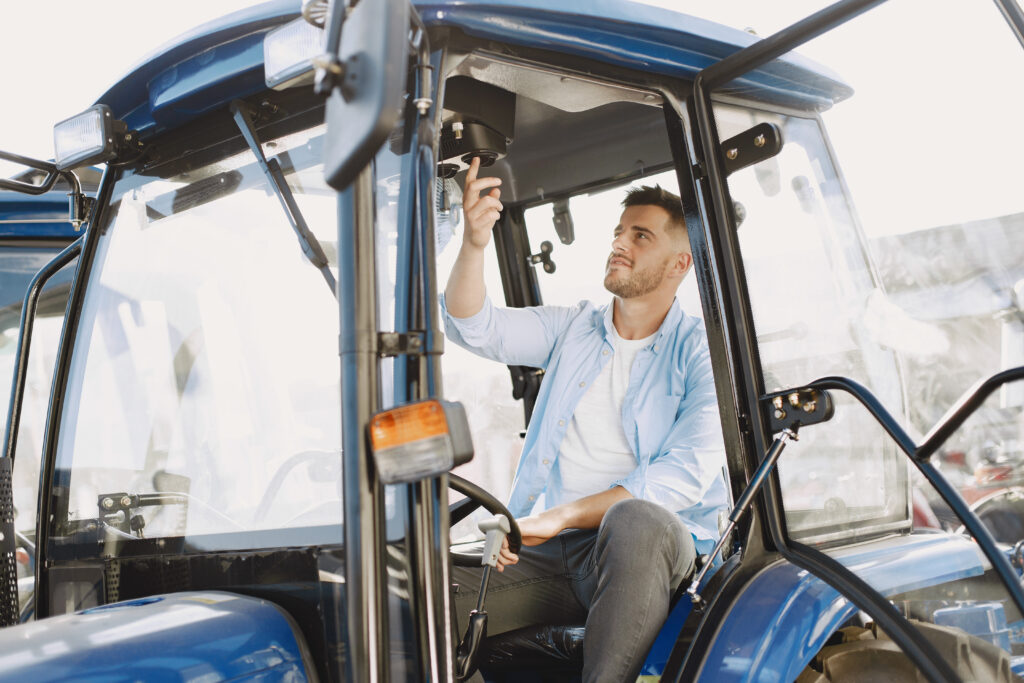 Tracteur enjambeur sous le soleil